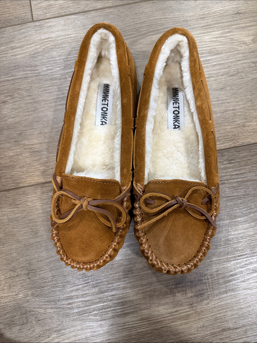 Minnetonka Women's Chestnut Suede Moccasins with Cream Lining